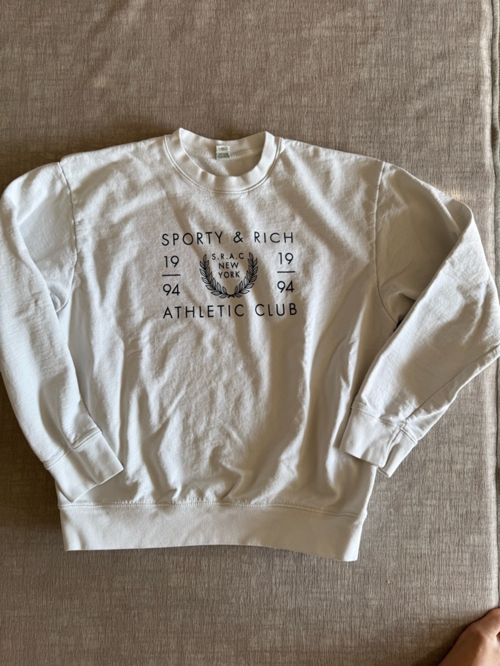 Sporty & Rich Cream Athletic Club Crewneck Sweatshirt with Navy Graphic